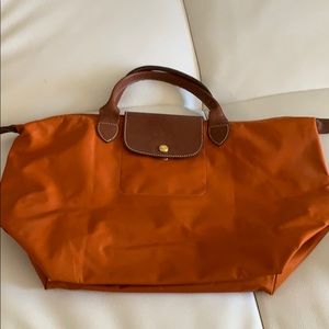 Longchamp midsize folding bag